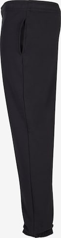 Effilé Pantalon Urban Classics en noir