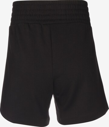 PUMA Regular Workout Pants 'T7' in Black