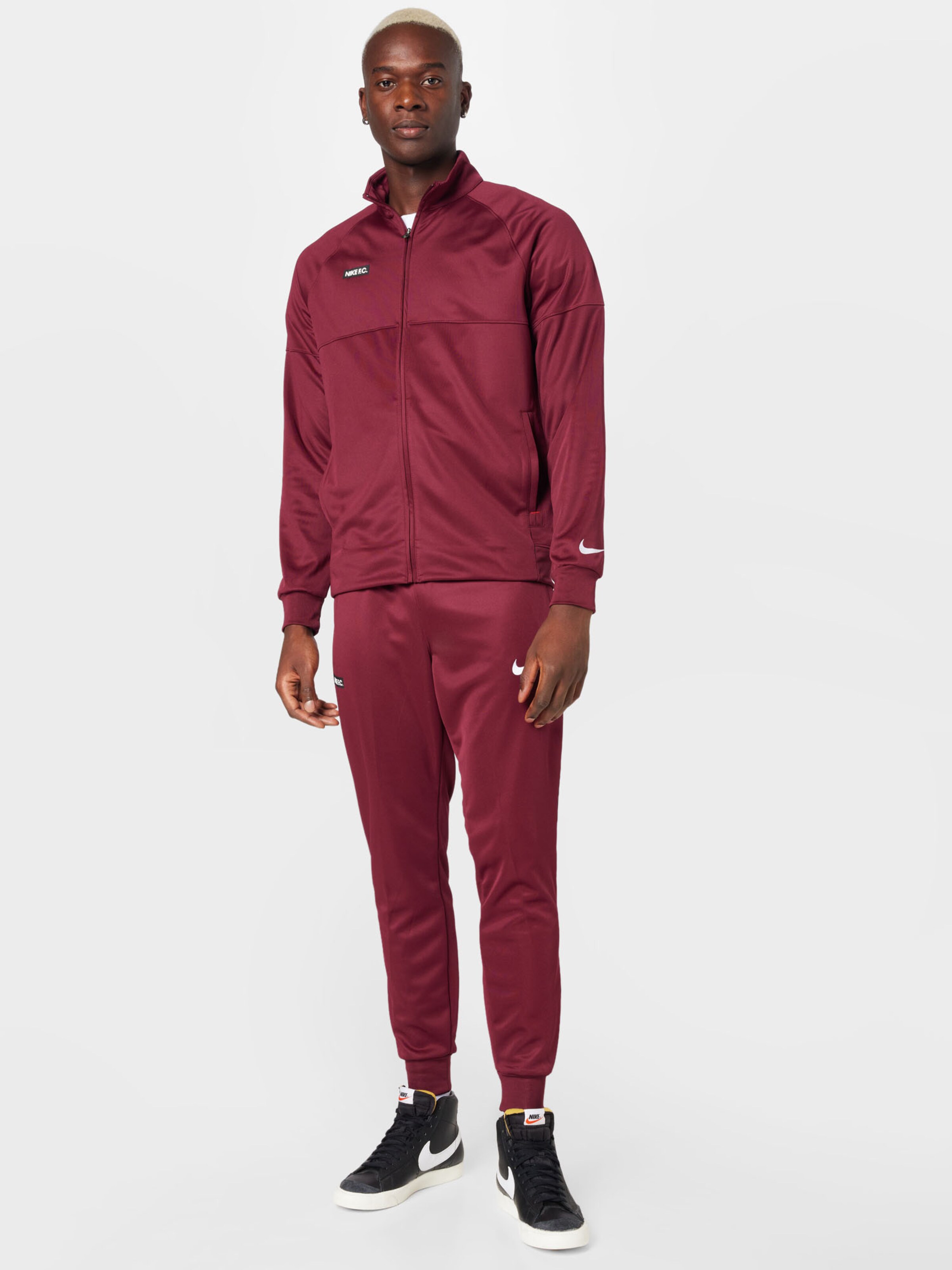 Nike season 2 hot sale woven tracksuit red