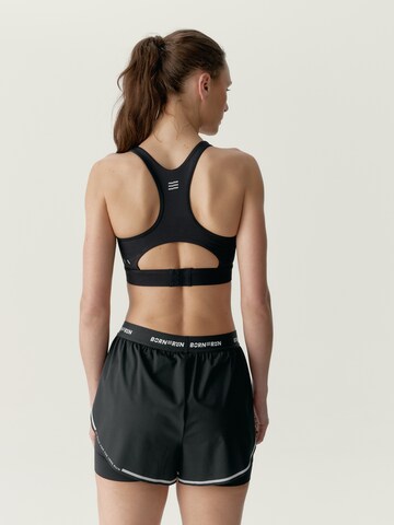 Born Sporttop ' Voltrun ' in Zwart
