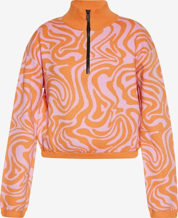 Pull-over swirly en orange : devant