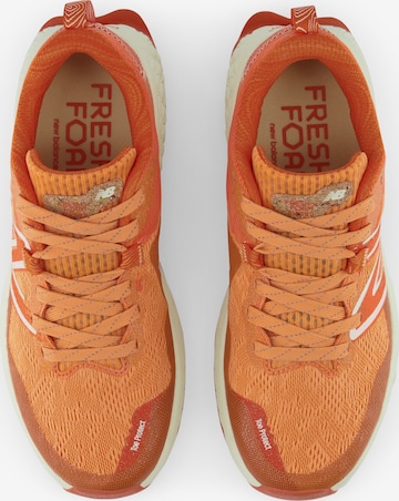 Chaussure de course 'Hierro' new balance en orange