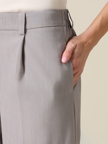 Baggy Pantaloni di oltre in grigio