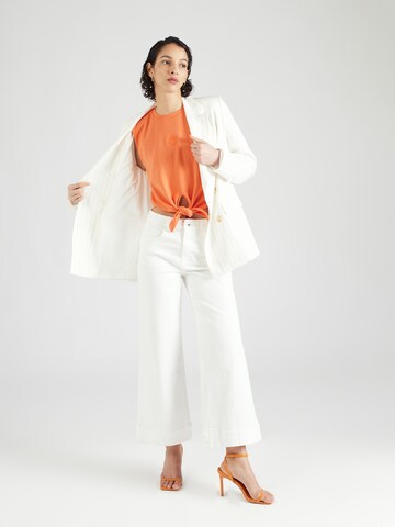 ABOUT YOU x Iconic by Tatiana Kucharova - Top 'Giulia' en naranja