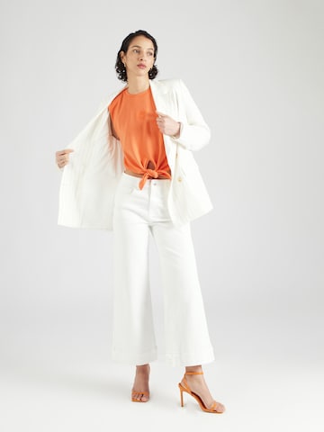 ABOUT YOU x Iconic by Tatiana Kucharova - Top 'Giulia' en naranja