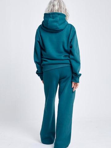 évasé Pantalon de sport 'Cotton Sweatpants' SPORTKIND en vert