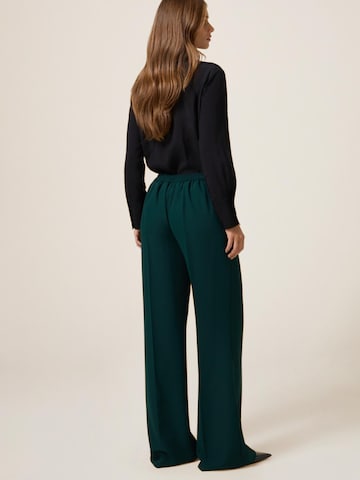 Flared Pantaloni di oltre in verde