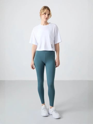 Tommy Life Leggings 'Gamaschen' - zöld: elől