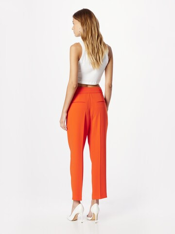 BOSS - regular Pantalón plisado 'Tapiah' en naranja