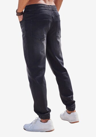 JOHN DEVIN Tapered Jeans in Schwarz