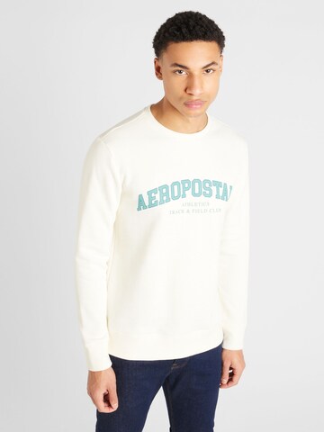 AÉROPOSTALE - Sweatshirt 'КRACK & FIELD' em bege: frente