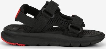 Scarpe da spiaggia / da bagno 'Evolve' di PUMA in nero