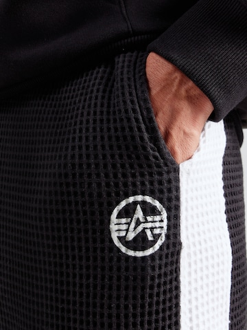 ALPHA INDUSTRIES Конический (Tapered) Штаны 'Studio' в Черный