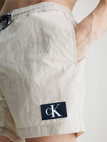 Calvin Klein Swimwear Board Shorts in Beige