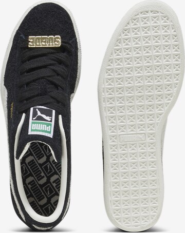 Baskets basses PUMA en noir