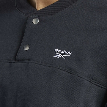 Bluză de molton de la Reebok pe negru