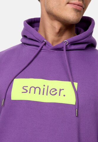 Sweat-shirt smiler. en violet