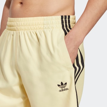 ADIDAS ORIGINALS Board Shorts 'Adicolor 3-Stripes' in Yellow