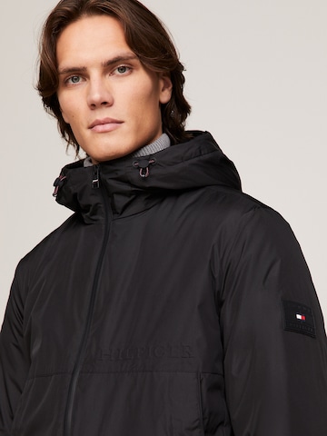 TOMMY HILFIGER Funkcionalna jakna | črna barva