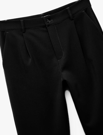 Koton Loose fit Pleat-front trousers in Black