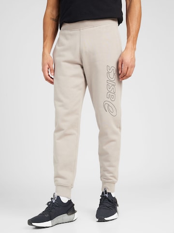 Regular Pantalon de sport ASICS en beige : devant