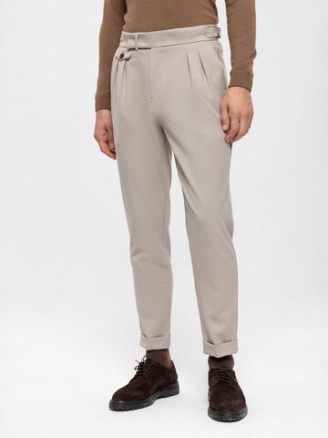 Antioch Tapered Pleat-front trousers in Beige