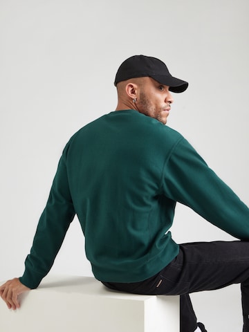Sweat-shirt 'American Script' Carhartt WIP en vert