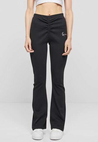 Karl Kani Flared Trousers in Black: front