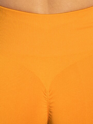 Smilodox Slimfit Sportbroek ' Scrunch Edina ' in Oranje