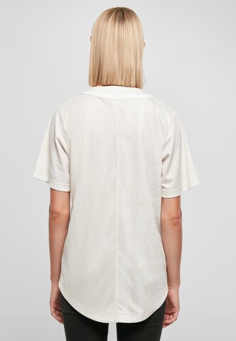 Chemisier Karl Kani en beige