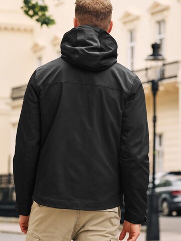 Veste fonctionnelle Next en noir