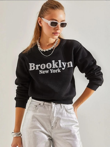 Sweat-shirt Bianco Lucci en noir : devant