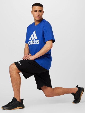 mėlyna ADIDAS SPORTSWEAR Sportiniai marškinėliai 'Essentials'