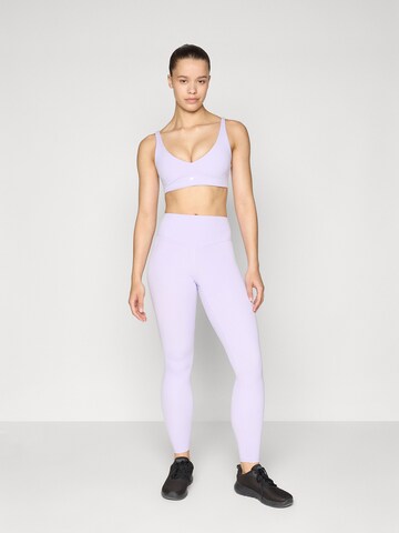 Fabletics Skinny Urheiluhousut 'PURELUXE' värissä lila