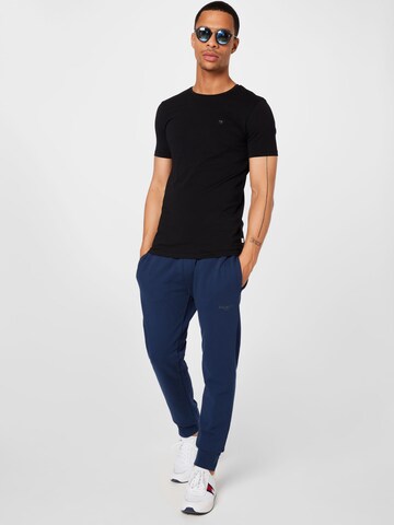 Tapered Pantaloni di Hackett London in blu