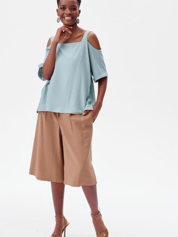 Blue Shadow Blouse in Green: front
