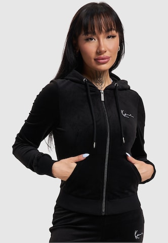 Karl Kani Zip-Up Hoodie in Black: front