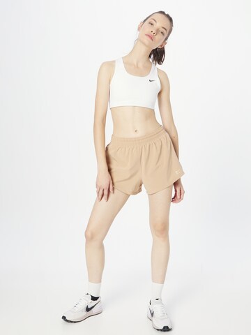 NIKE Regular Sportshorts in Beige