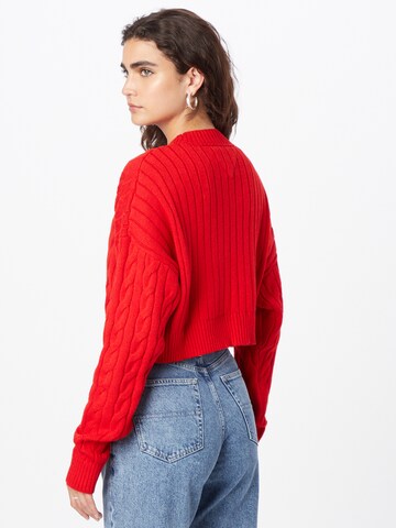 Tommy Jeans Пуловер в червено