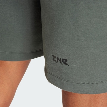 ADIDAS SPORTSWEAR Lużny krój Spodnie sportowe 'Z.N.E. Premium' w kolorze szary