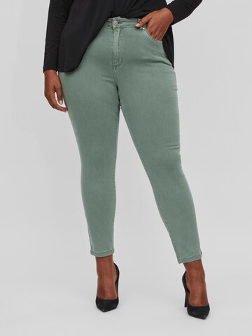 EVOKED Skinny Jeans in Green: front