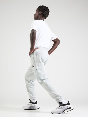 ADIDAS SPORTSWEAR Tapered Sportbyxa i vit