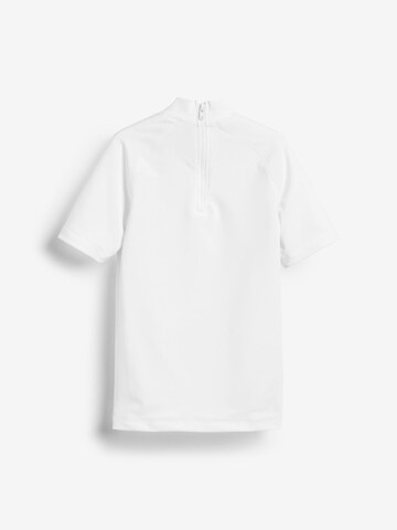 Protezione dai raggi UV di Next in bianco