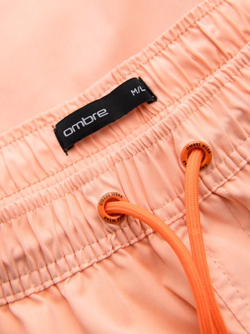 regular Pantaloni sportivi di Ombre in arancione