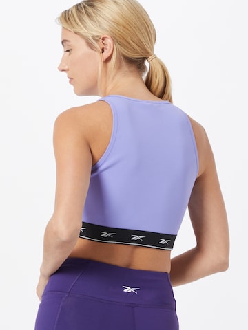 Reebok Skinny Sports top in Purple