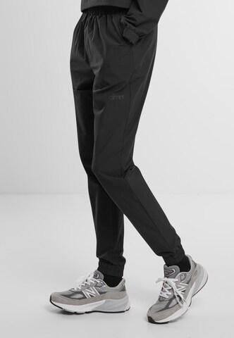 Aim'n - Tapered Pantalón en negro