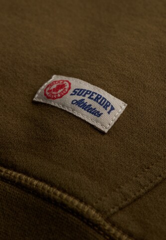 Superdry & Co Collegepaita '1954 Company' värissä ruskea