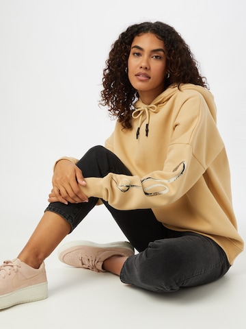 ABOUT YOU Limited Sweatshirt 'Kiki' by Swantje Paulina in Beige