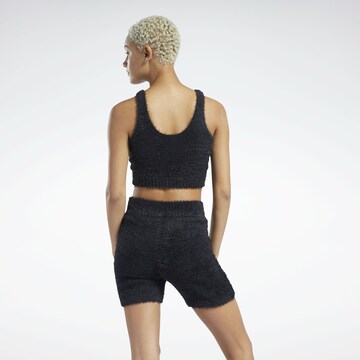 Tops en tricot Reebok en noir