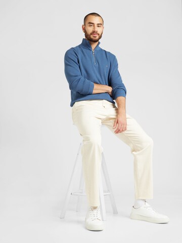 TOMMY HILFIGER Svetr – modrá